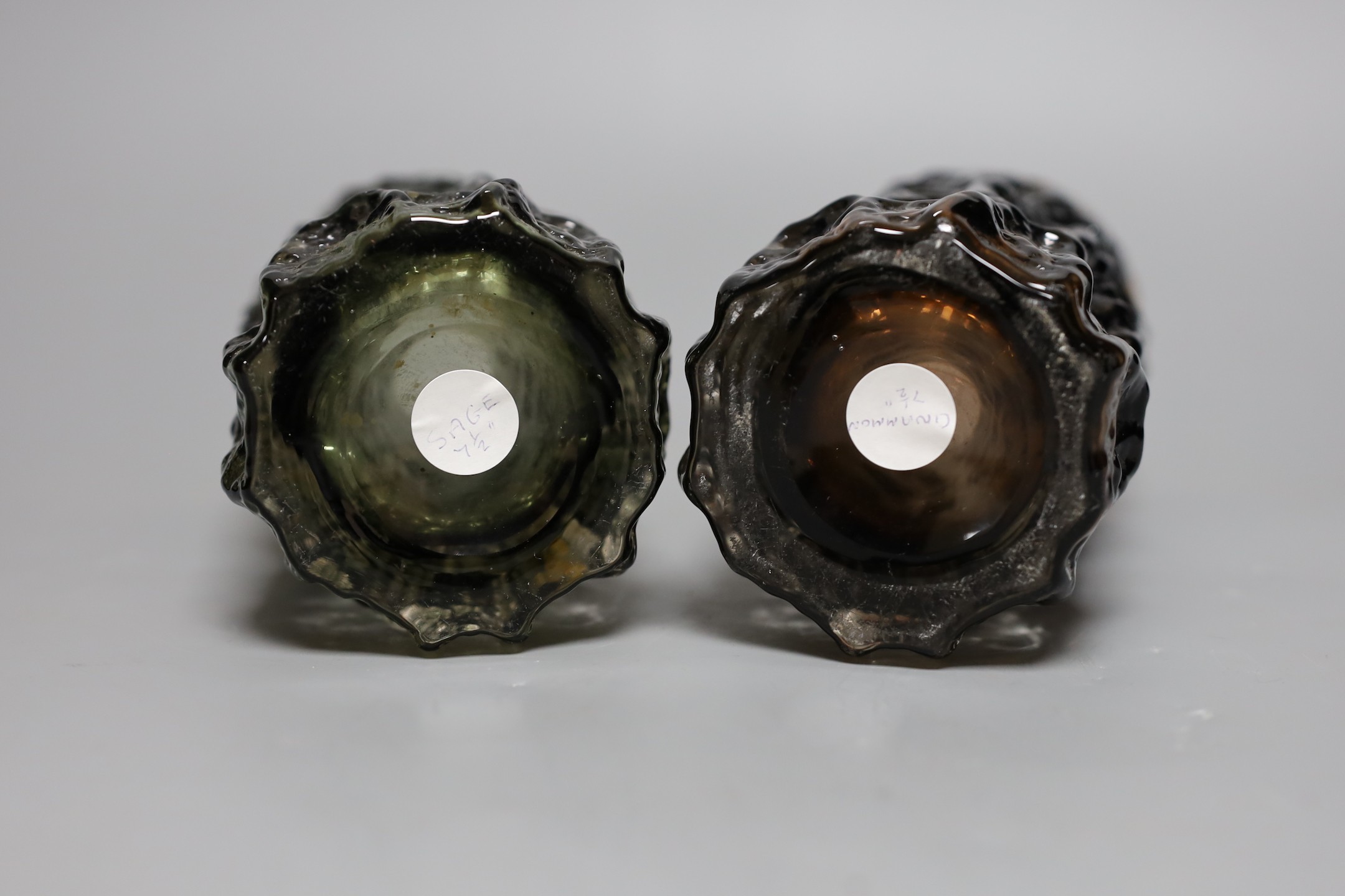 Two Whitefriars 'bark' cylinder vases, model 9689 designed by Geoffrey Baxter in 'sage' and 'cinnamon' glass, each 19cn high.